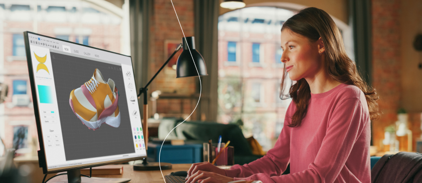 Mujer desarrolla proyectos de diseño gráfico interactivo y experiencias digitales.